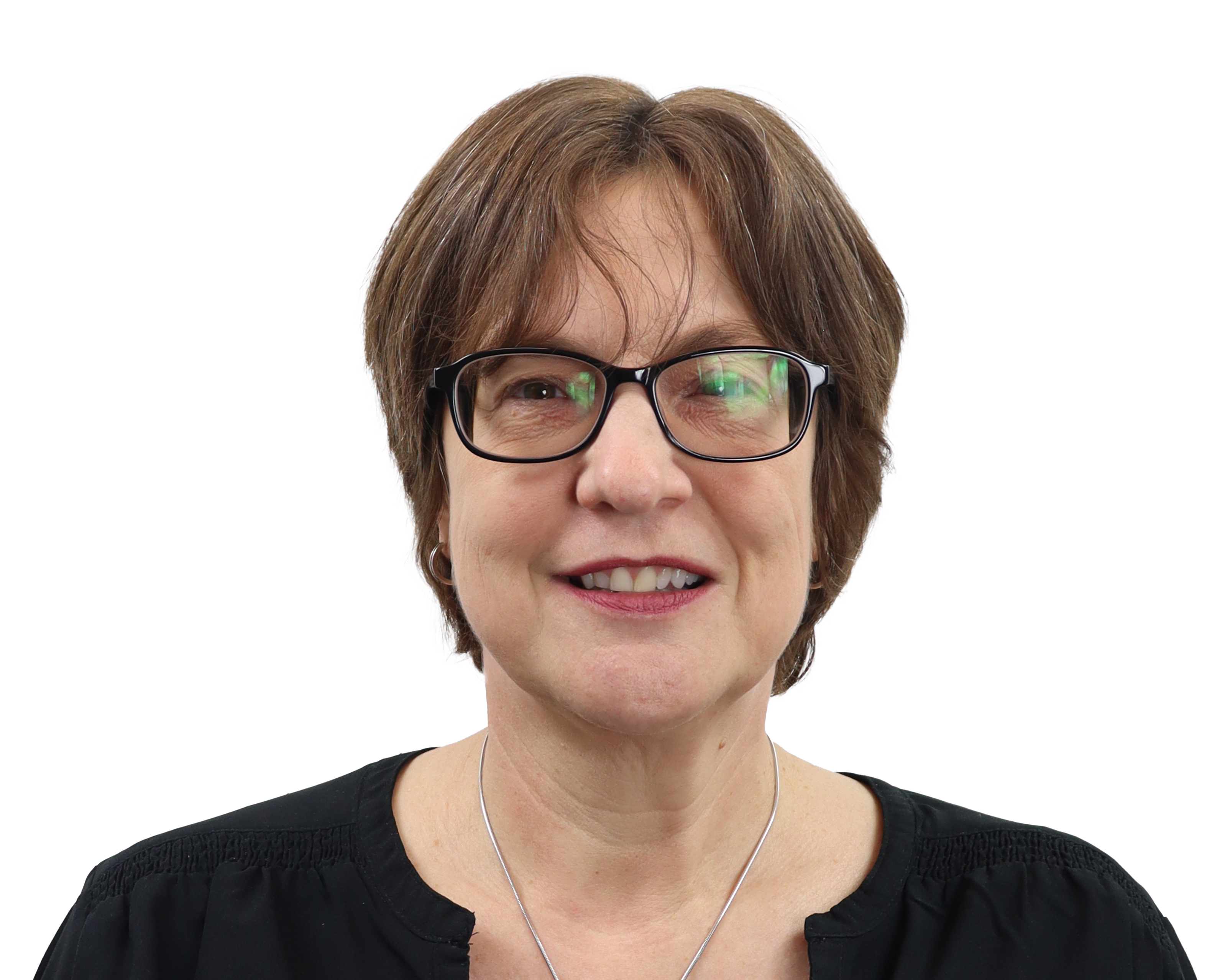 Professional headshot portrait of a person wearing glasses and a black top against a white background, suitable for school staff directory or identification purposes.